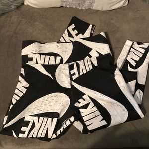 Nike leggings black and white swoosh.
